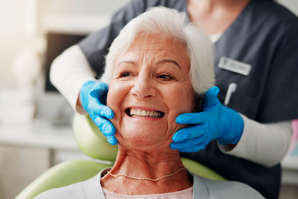 When To Consider Implant-Supported Dentures Over Traditional Dentures
